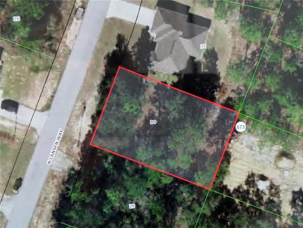 This is an aerial map showing a vacant residential lot outlined in red — 8949 N LANSEN WAY, CITRUS SPRINGS, FL