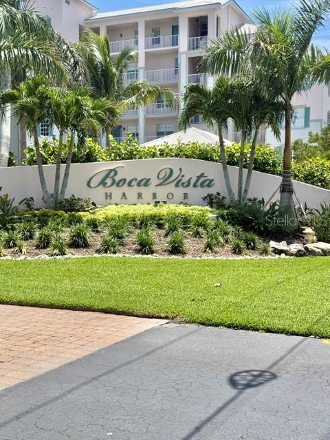 A sign for Boca Vista Harbor stands in front of palm trees and a building — 13413 GASPARILLA ROAD UNIT 304, PLACIDA, FL