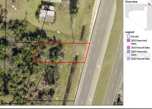 This aerial map shows a vacant rectangular parcel of land adjacent to a multi-lane highway — US-231, FOUNTAIN, FL