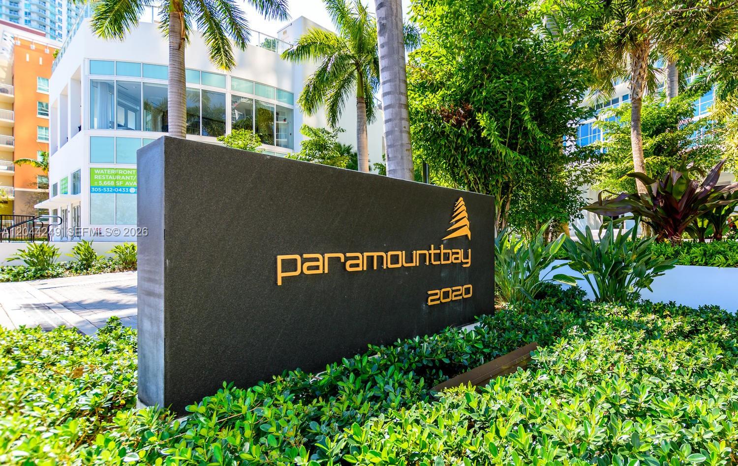 A dark monument sign with the name Paramount Bay stands in front of a building — 2020 N Bayshore Dr # 3904, Miami FL 33137, MIAMI, FL