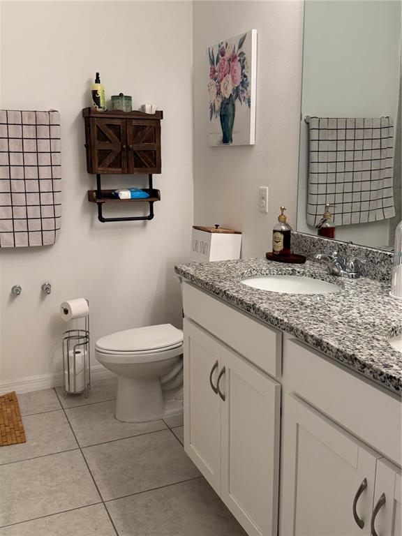 This is a floor plan showing a house with a garage, four bedrooms, and three bathrooms — 24409 SUNNYS HALO WAY, SORRENTO, FL