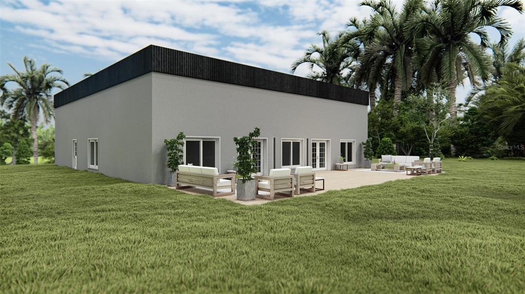 A digital rendering of a modern, flat-roofed house with a patio and outdoor furniture — 12493 WILLMINGTON BOULEVARD, PORT CHARLOTTE, FL