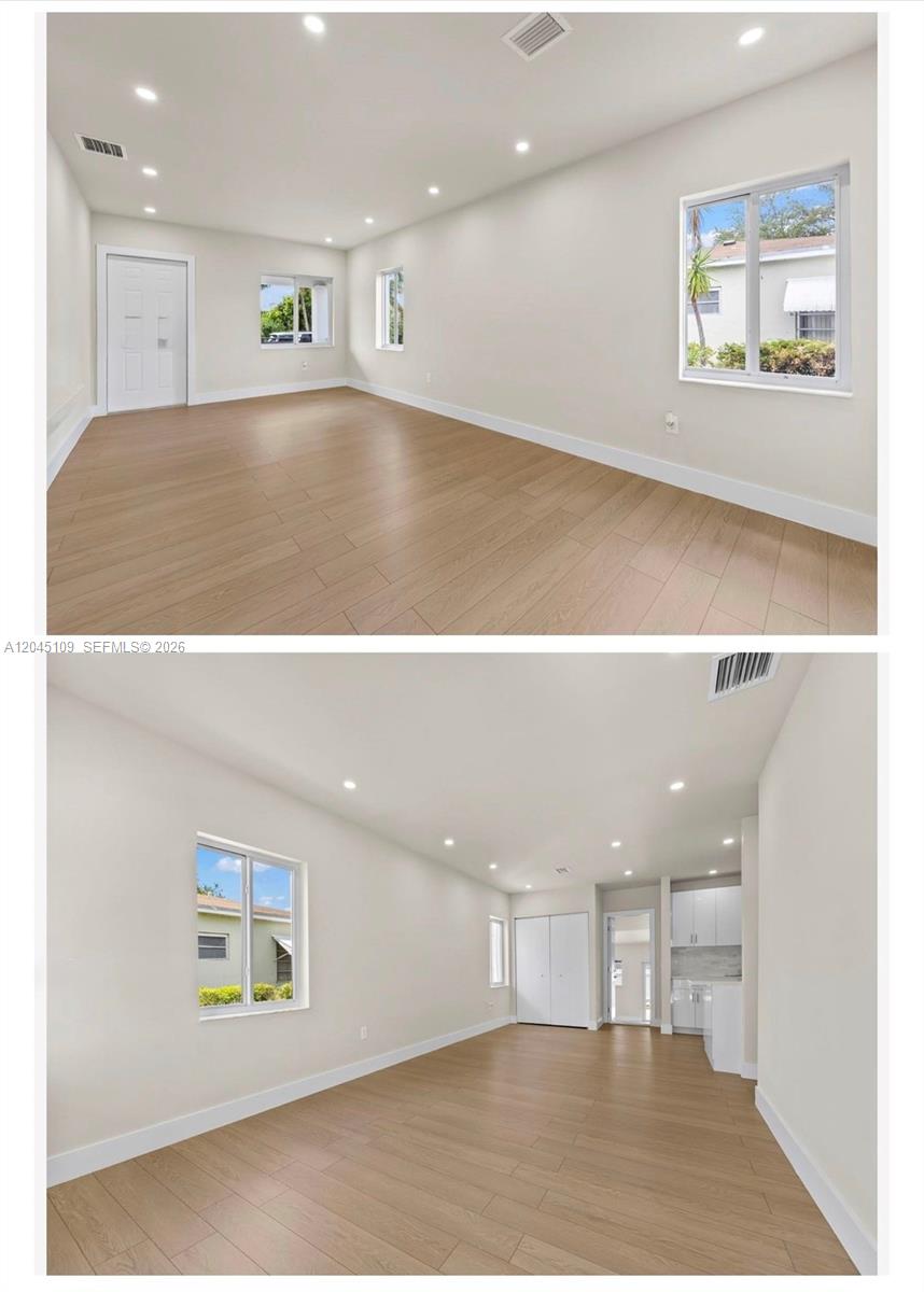 This room features light wood-look flooring, recessed lighting, white walls, and a small kitchenette — 3455 E 1st Ct # 3455, Hialeah FL 33013, HIALEAH, FL
