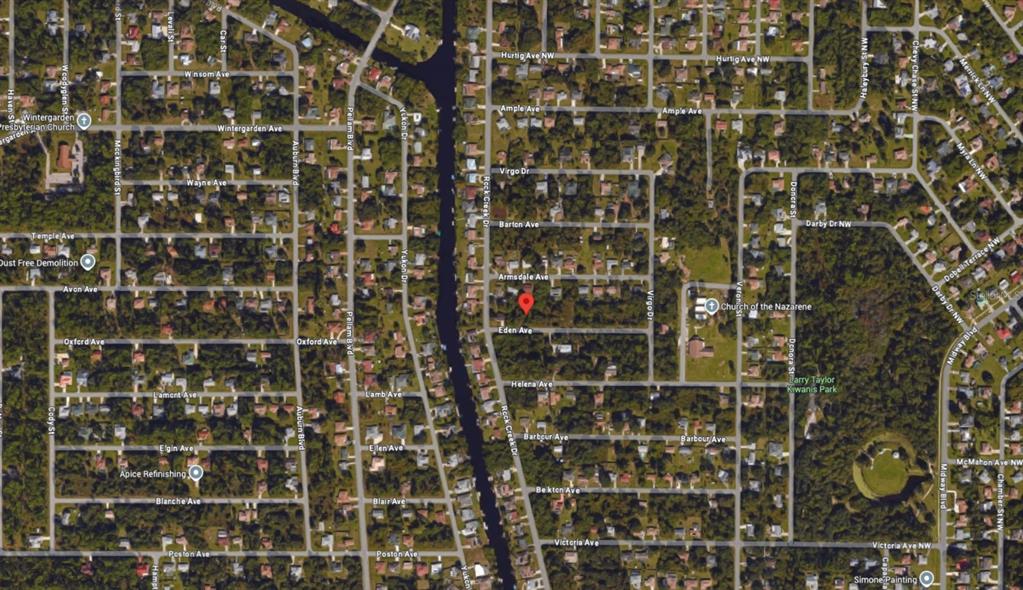 This is an aerial map view of a residential neighborhood with a central red location marker — 1272 EDEN AVENUE, PORT CHARLOTTE, FL