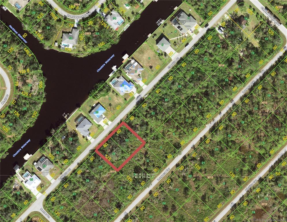 This is an aerial map showing a vacant residential lot highlighted in red — 1060 CHESHIRE STREET, PORT CHARLOTTE, FL