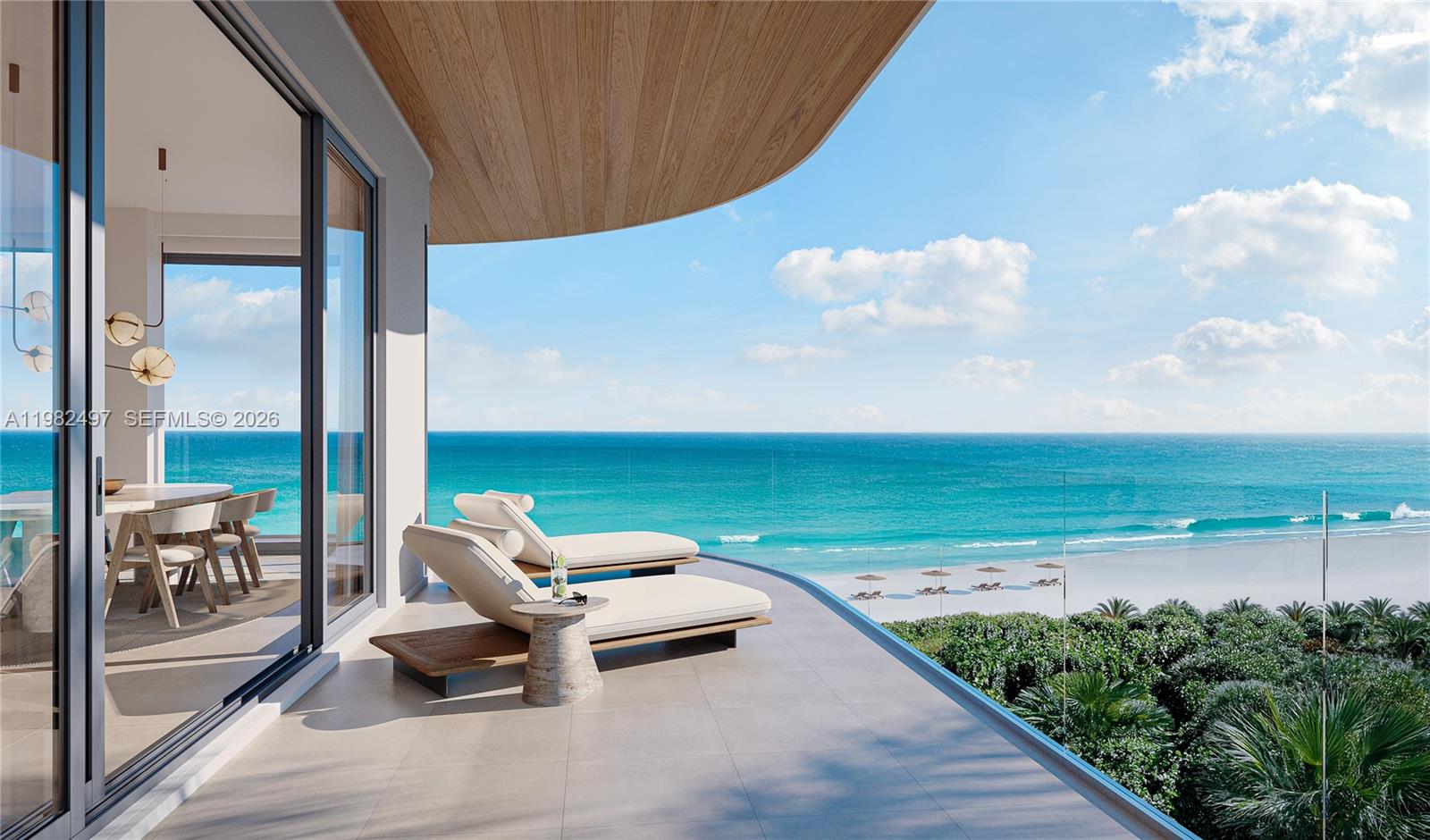 This rendering shows a modern balcony with lounge chairs overlooking a beach and ocean — 901 S Ocean Dr. # 612, Hollywood FL 33019, HOLLYWOOD, FL