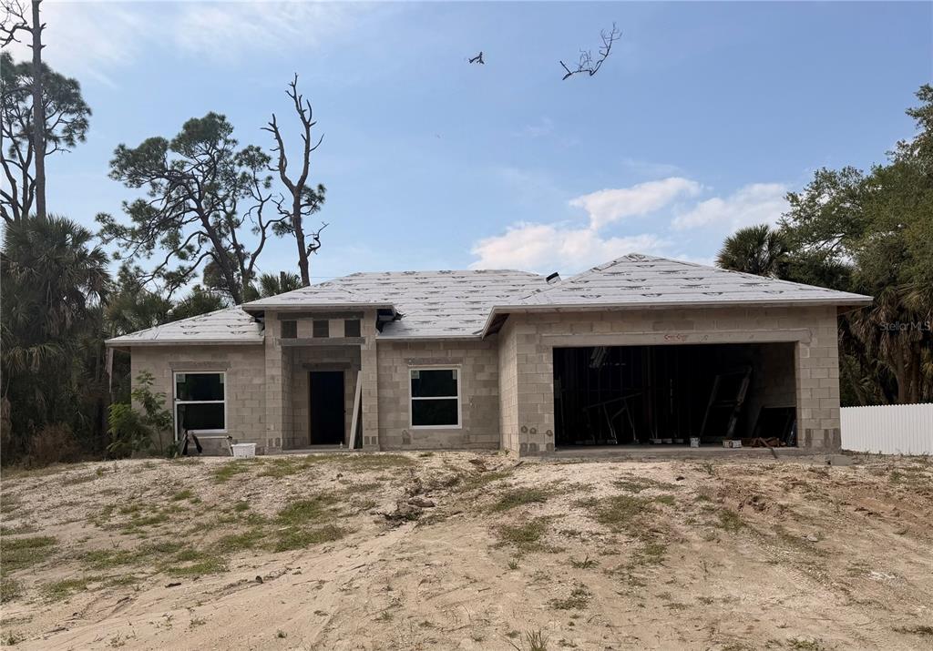 A single-story house under construction with concrete block walls and a roof underlayment — 175 TROUTDALE STREET, PORT CHARLOTTE, FL