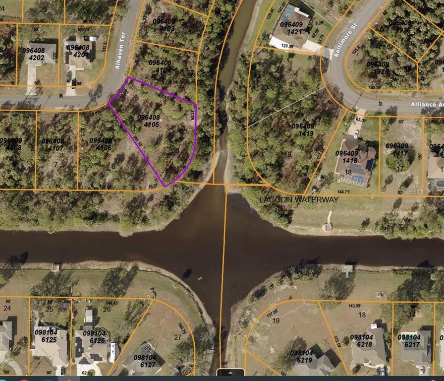 This is a satellite map showing residential lots and a waterway — Lot 5 ALHAVEN TERRACE, NORTH PORT, FL