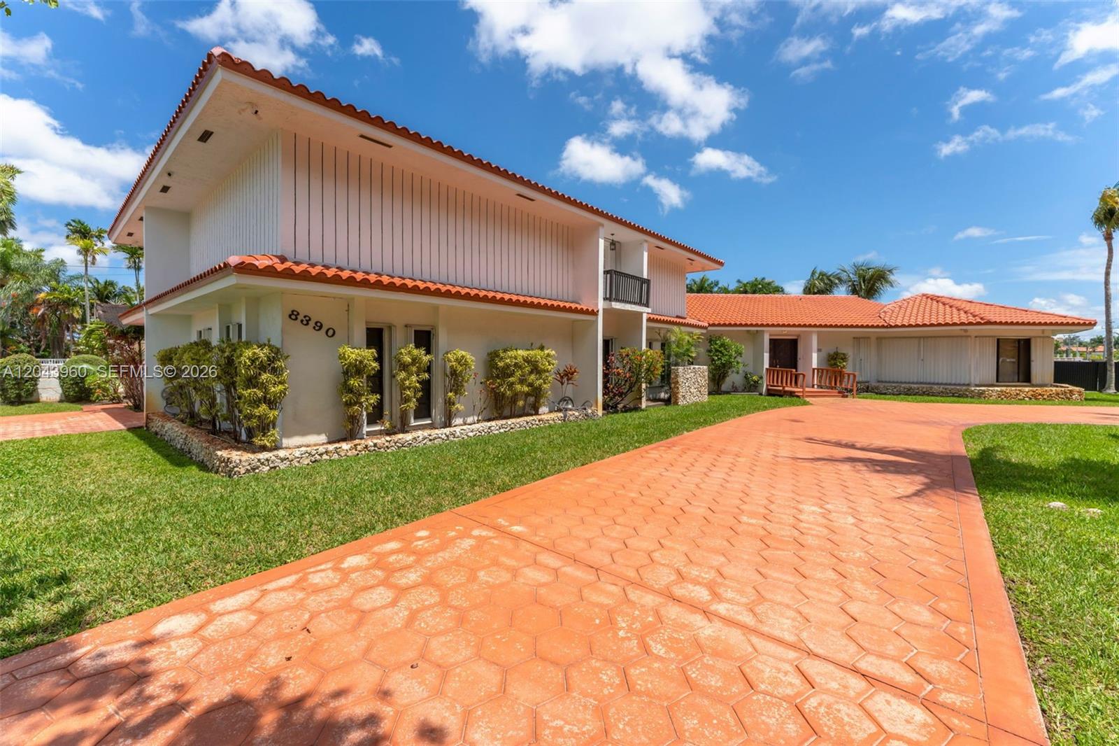 A two-story house with a red tile roof and a hexagonal paver driveway — 8390 SW 2nd St # 0, Miami FL 33144, MIAMI, FL