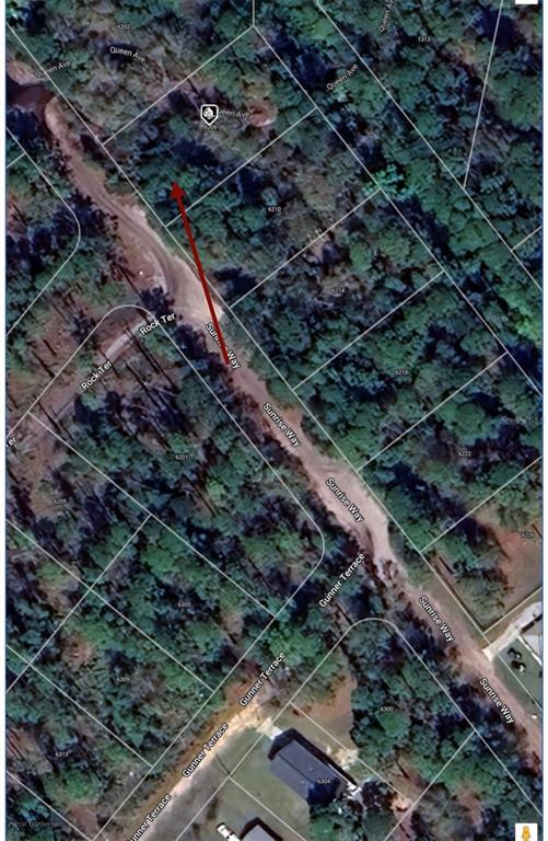 This is an aerial map showing a vacant lot with a red arrow pointing toward it — 6206 SUNRISE WAY, SEBRING, FL