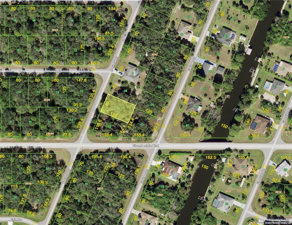 This is a satellite map showing residential property lots, streets, and a canal — 544 BERTHOUD STREET, PORT CHARLOTTE, FL