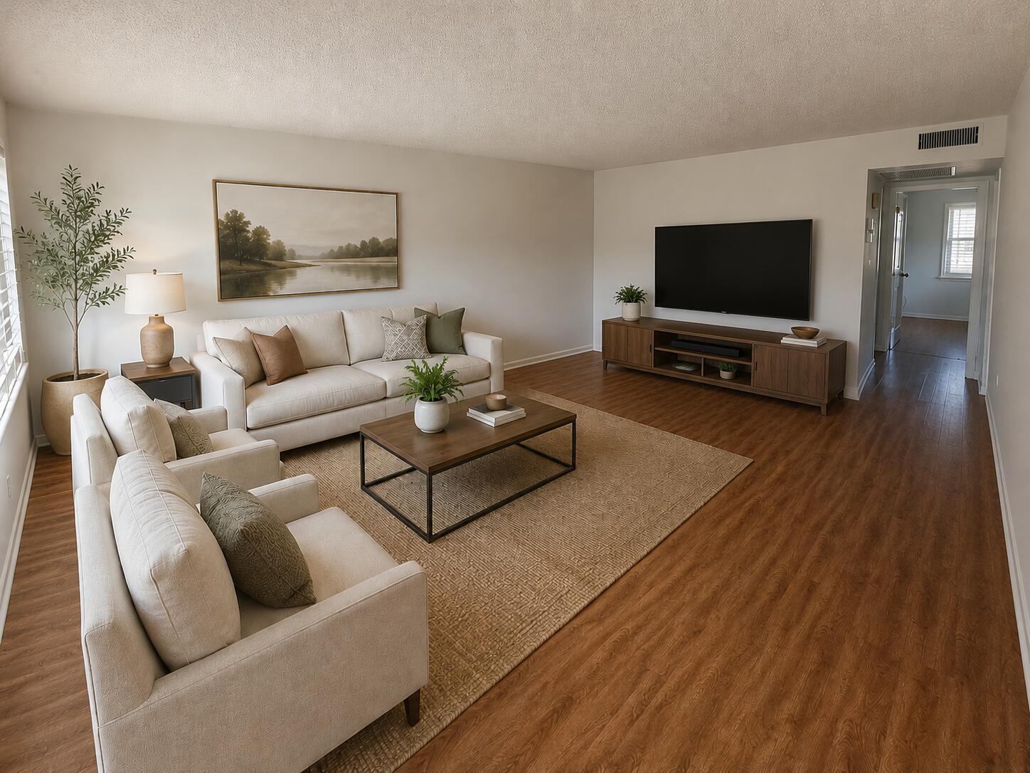 A living room features a white sofa, two armchairs, a coffee table, and a television — 434 Mansfield K, Boca Raton FL 33434, BOCA RATON, FL