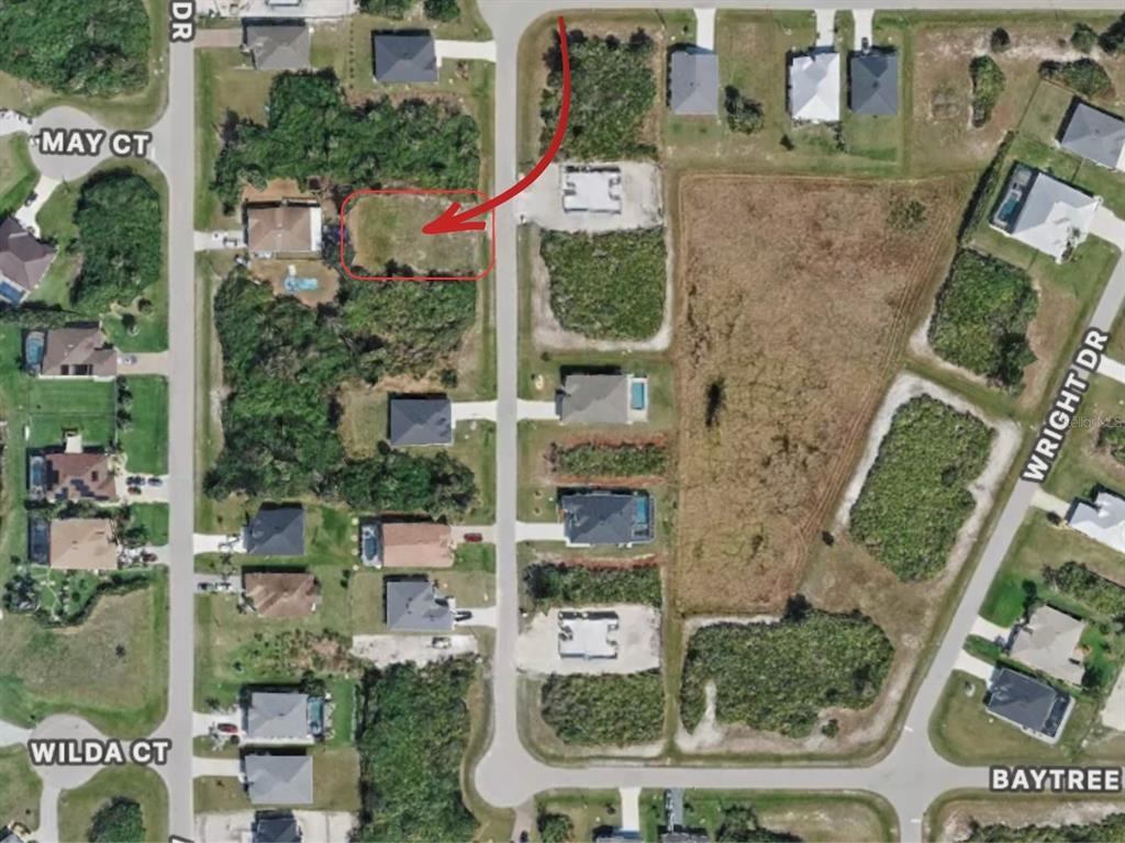 This aerial map shows a vacant residential lot highlighted by a red arrow and border — 171 WRIGHT DRIVE, ROTONDA WEST, FL