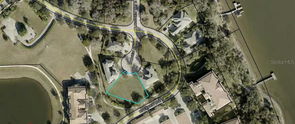 This is an aerial map showing a vacant residential lot outlined in blue on a cul-de-sac — 6 OAKVIEW COURT, PALM COAST, FL