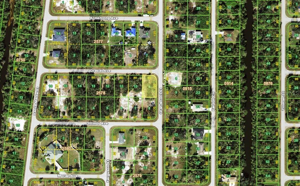 This is an aerial map showing residential lots and streets in a suburban neighborhood — 101 GRANDMONT STREET, PORT CHARLOTTE, FL