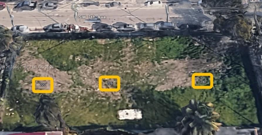 An aerial view shows three vacant, undeveloped residential lots along a paved street — 240 SW 7TH AVE, Miami FL 33130, MIAMI, FL