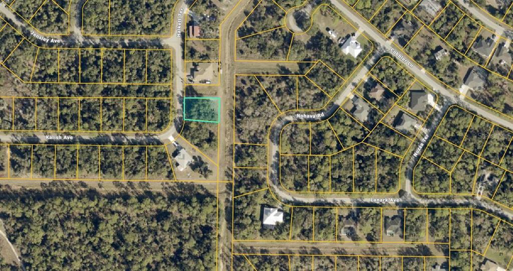This is an aerial map showing a vacant, rectangular residential lot highlighted in blue — Lot 14 HALKETT TERRACE, NORTH PORT, FL