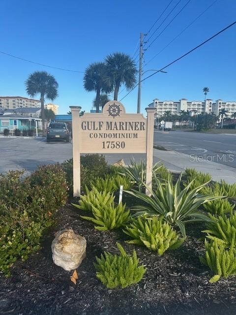 A sign for the Gulf Mariner Condominium stands in a landscaped area near a road — 17580 GULF BOULEVARD UNIT 403, REDINGTON SHORES, FL