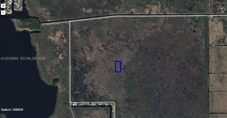An aerial map view shows a rectangular plot of land highlighted in blue — 0 UNKNOWN, Cocoa FL 32926, COCOA, FL