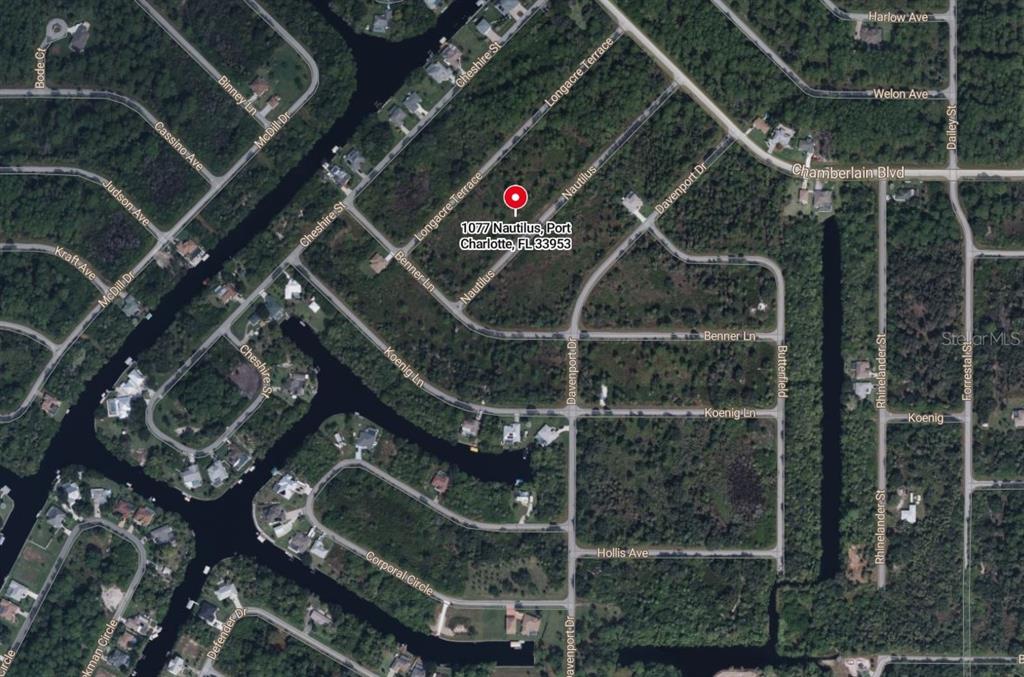 This is an aerial map showing a residential lot in Port Charlotte, Florida — 1077 NAUTILUS TERRACE, PORT CHARLOTTE, FL