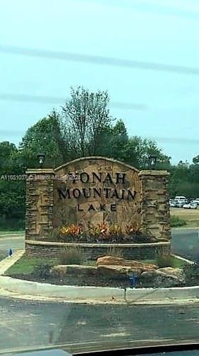 A stone monument sign for Yonah Mountain Lake stands at the entrance of a residential community — Yonah Lake Dr Lot 6, GA 30571, GA