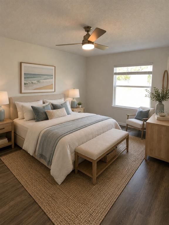 A bedroom features a queen bed, a ceiling fan, a window, and a wooden bench — 4 LEMA PLACE, PALM COAST, FL