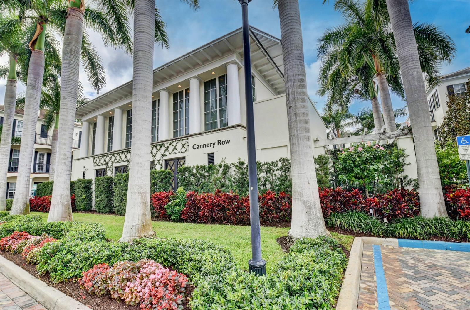 A white building with columns and the name Cannery Row is surrounded by palm trees — 134 Madison Lane, Delray Beach FL 33444, DELRAY BEACH, FL