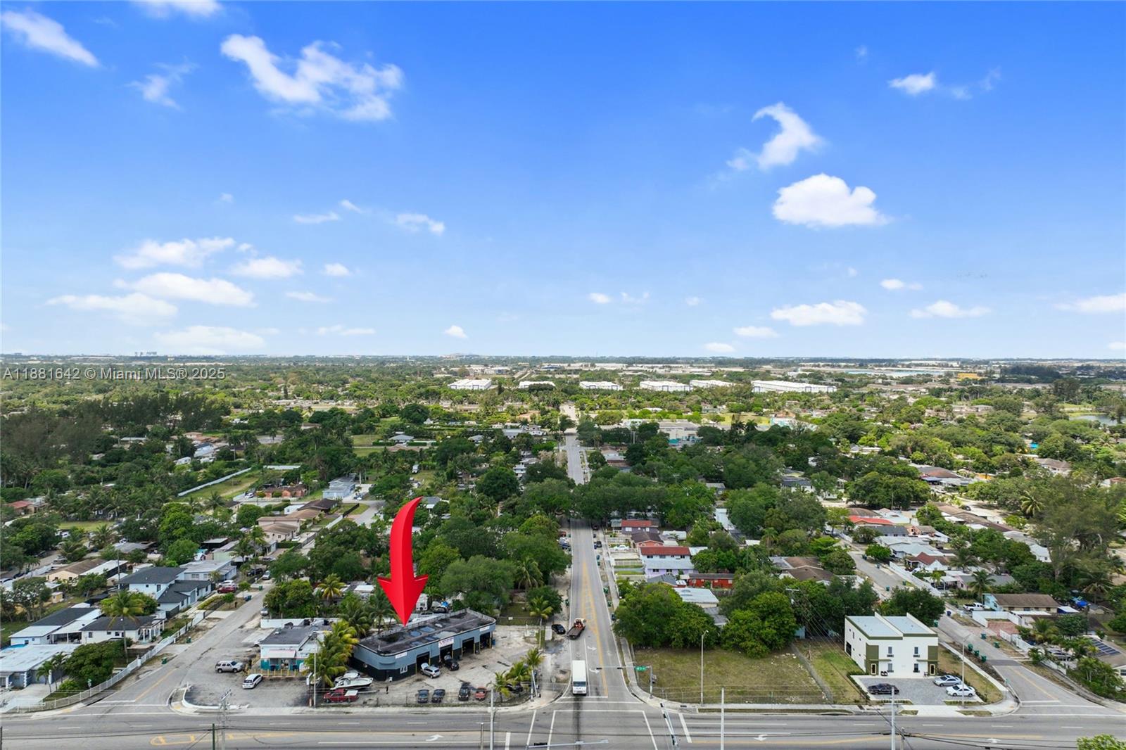 An aerial view shows a commercial building with a red arrow pointing toward it — 11070 NW 17th Ave, Miami FL 33167, MIAMI, FL