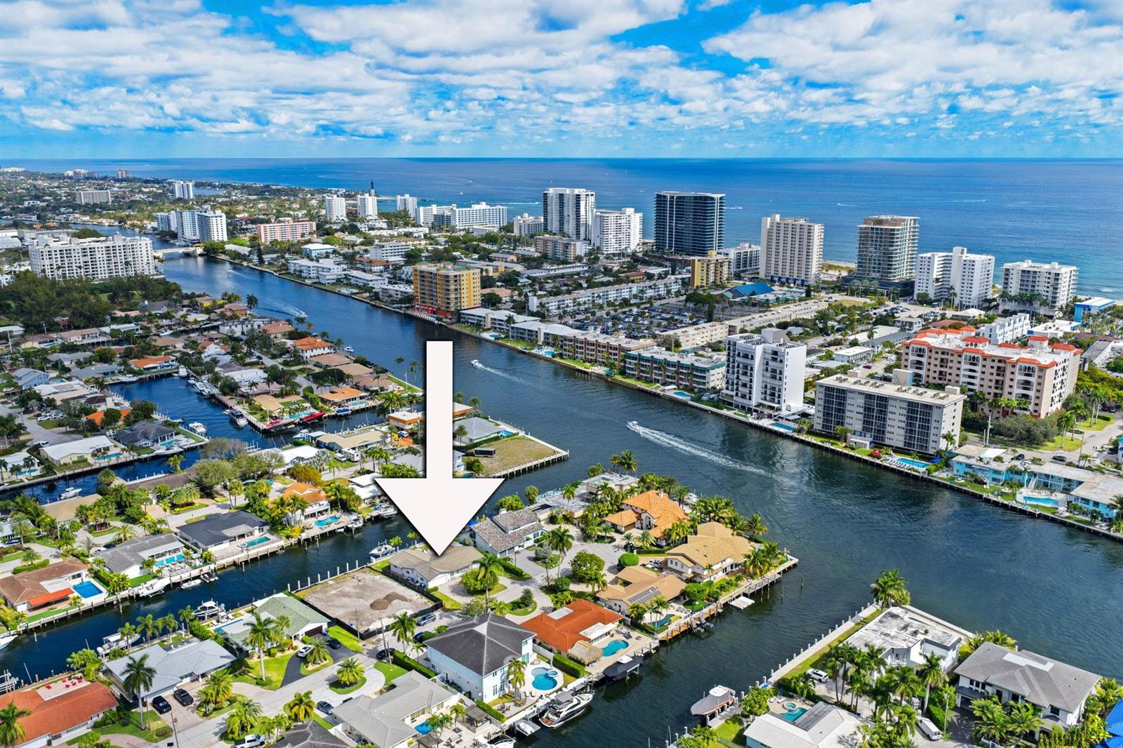 An aerial view shows a waterfront house with a pool, marked by a large white arrow — 2821 NE 9th Court, Pompano Beach FL 33062, POMPANO BEACH, FL