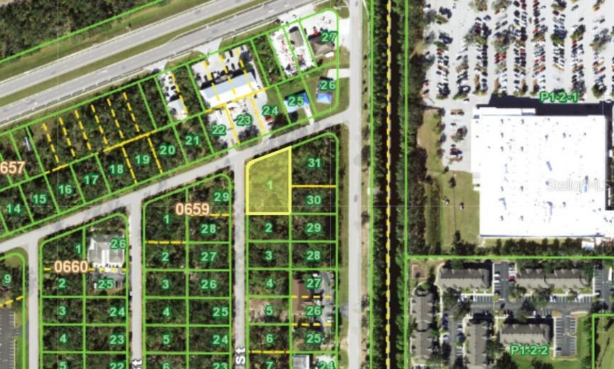 This is an aerial map showing a highlighted vacant lot within a residential subdivision — 1376 LULLABY STREET, PORT CHARLOTTE, FL