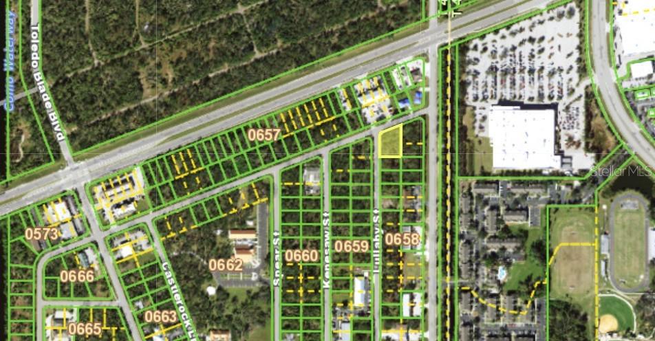 This is an aerial map showing a highlighted vacant lot within a residential neighborhood — 1376 LULLABY STREET, PORT CHARLOTTE, FL