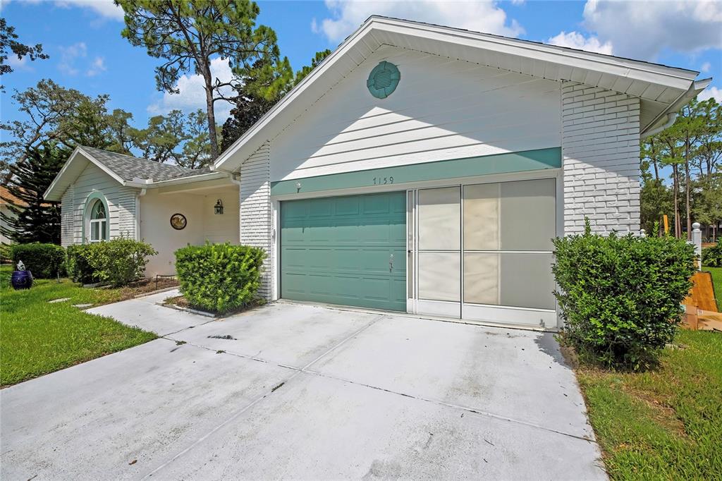 7159 CROWN OAKS DRIVE, SPRING HILL, FL — photo 4 of 30