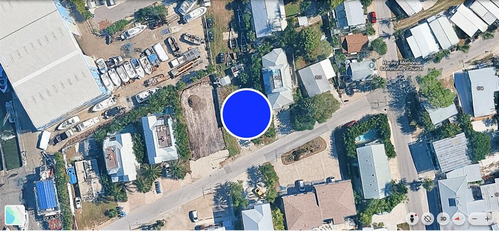 This is an aerial map view showing a vacant lot surrounded by residential and commercial buildings — 207 CHURCH AVENUE, BRADENTON BEACH, FL