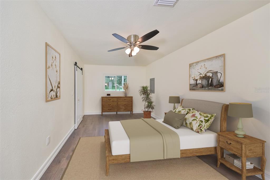 This is a digital rendering of a bedroom featuring a bed, dresser, and ceiling fan — 10922 PARK DRIVE, RIVERVIEW, FL