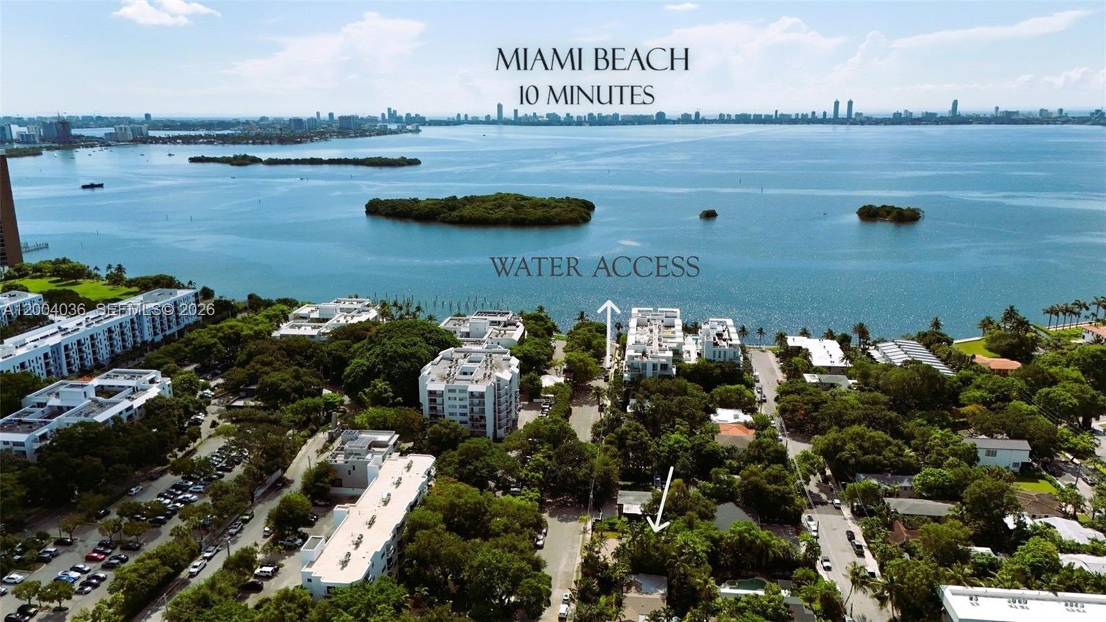 An aerial view shows a residential neighborhood with lush trees, apartment buildings, and waterfront access — 666 NE 62nd St, Miami FL 33138, MIAMI, FL
