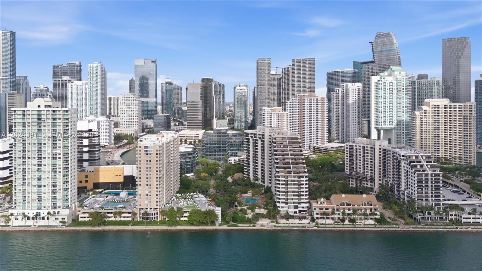 An aerial view shows a dense skyline of high-rise buildings along a waterfront — 520 Brickell Key Dr # A1615, Miami FL 33131, MIAMI, FL