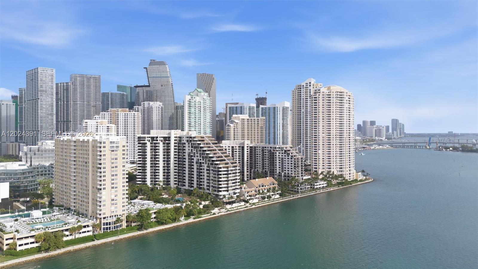 An aerial view of the Miami skyline featuring numerous high-rise residential buildings along the waterfront — 520 Brickell Key Dr # A1615, Miami FL 33131, MIAMI, FL