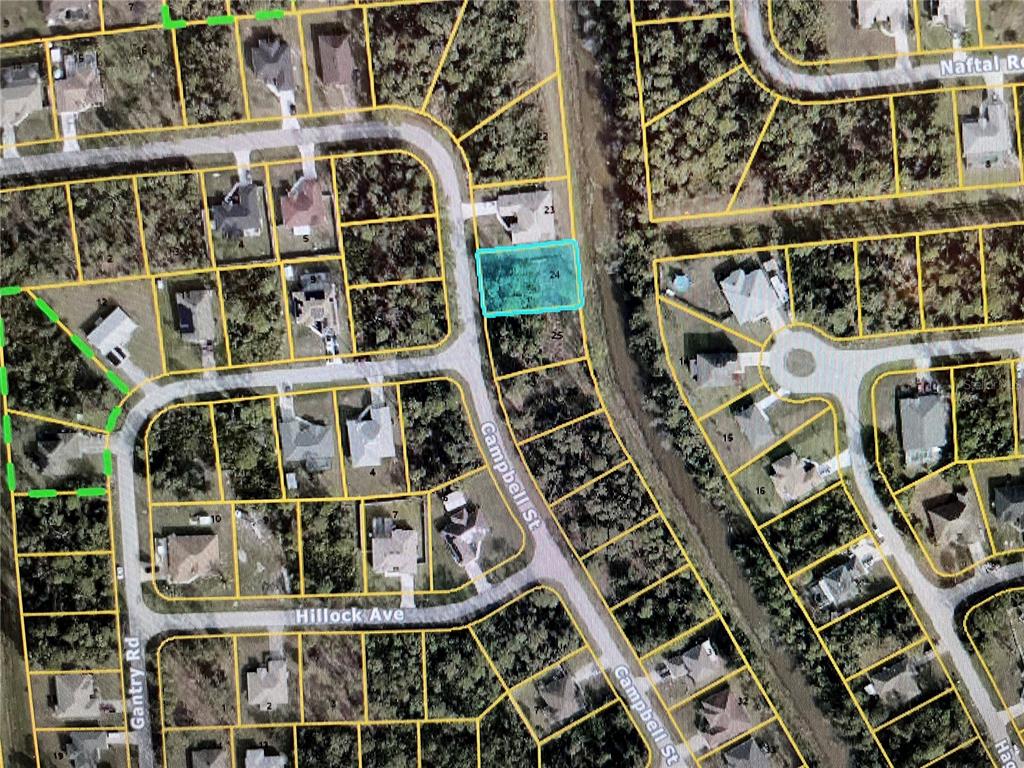 This is an aerial map showing a highlighted vacant residential lot on a suburban street — LOT 24 CAMPBELL STREET, NORTH PORT, FL