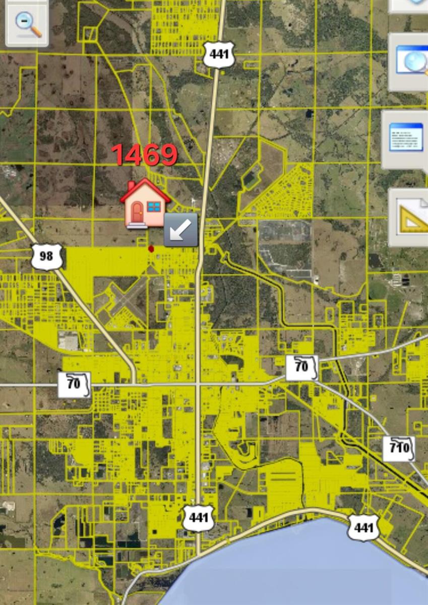 This is a map showing a property location highlighted with a house icon near highways — 1469 NW 39th Circle, Okeechobee FL 34972, OKEECHOBEE, FL