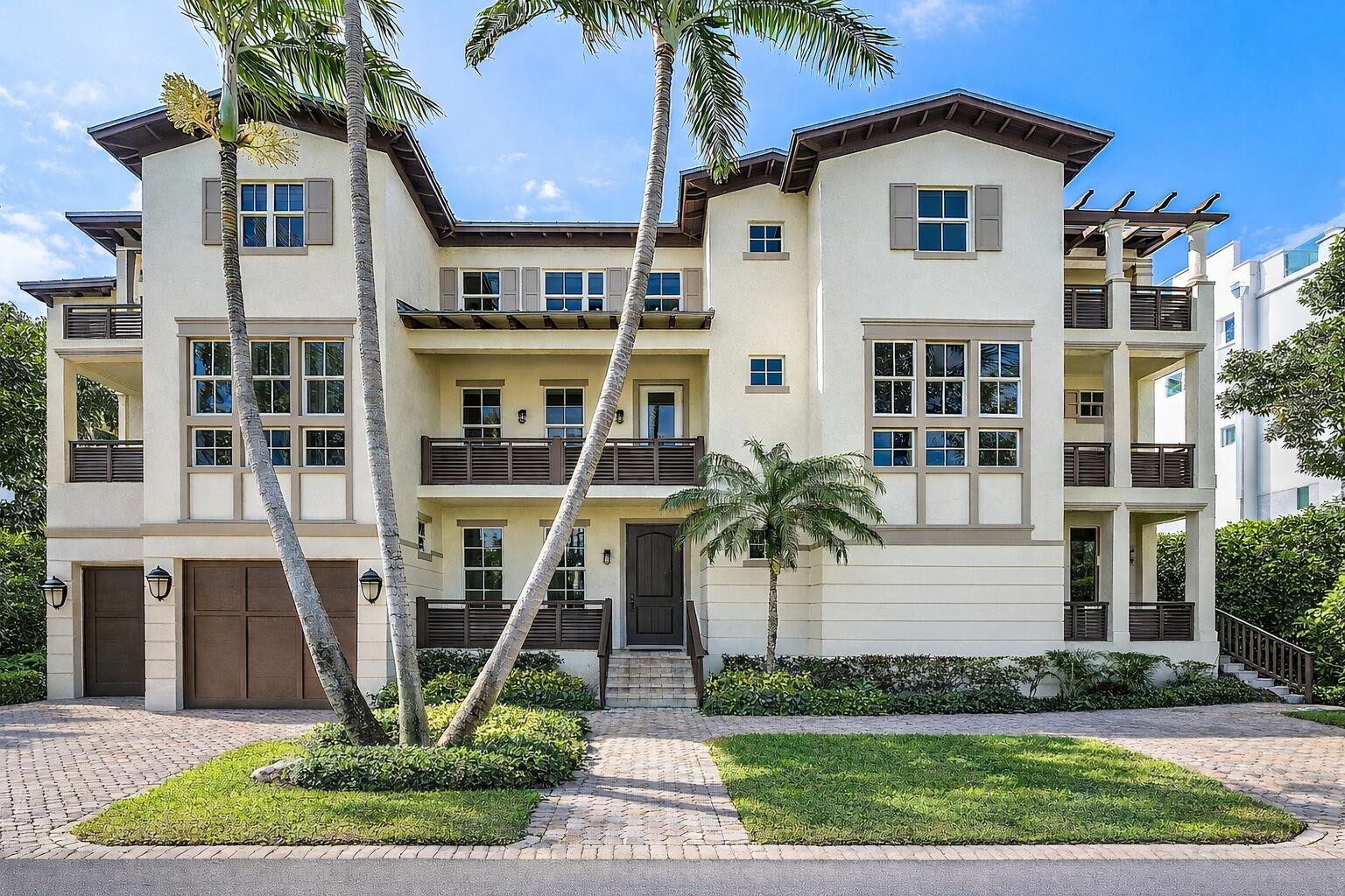 A three-story stucco house with a garage, balconies, and palm trees in the front yard — 1108 Coconut Row, Delray Beach FL 33483, DELRAY BEACH, FL