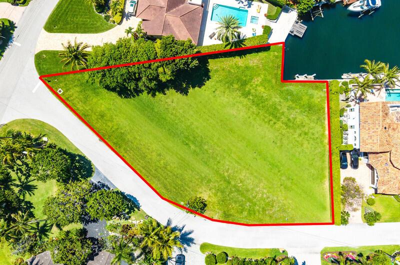 An aerial view shows a vacant, irregularly shaped waterfront lot outlined in red — 103 Bonito Drive, Ocean Ridge FL 33435, OCEAN RIDGE, FL