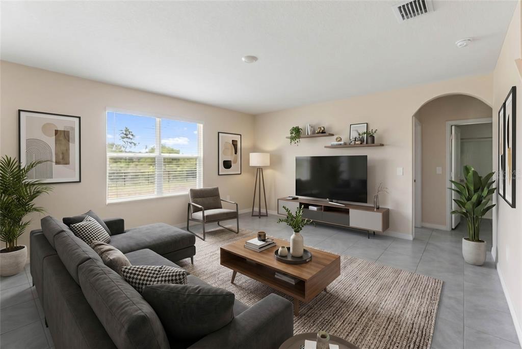 A two-story suburban house with a white exterior, a two-car garage, and a concrete driveway — 17448 HARVEST MOON WAY, BRADENTON, FL