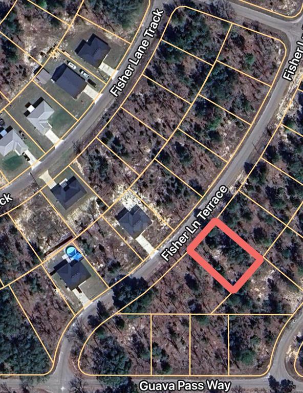 This is an aerial map view of a vacant residential lot outlined in red — FISHER LANE TERRACE UNIT 6, OCKLAWAHA, FL