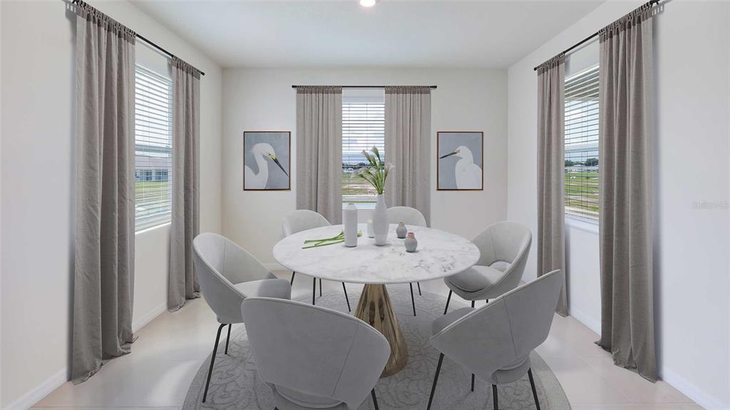 A dining room features a round marble table, six gray chairs, and three windows — 3509 HAZY GLEN LANE, PLANT CITY, FL