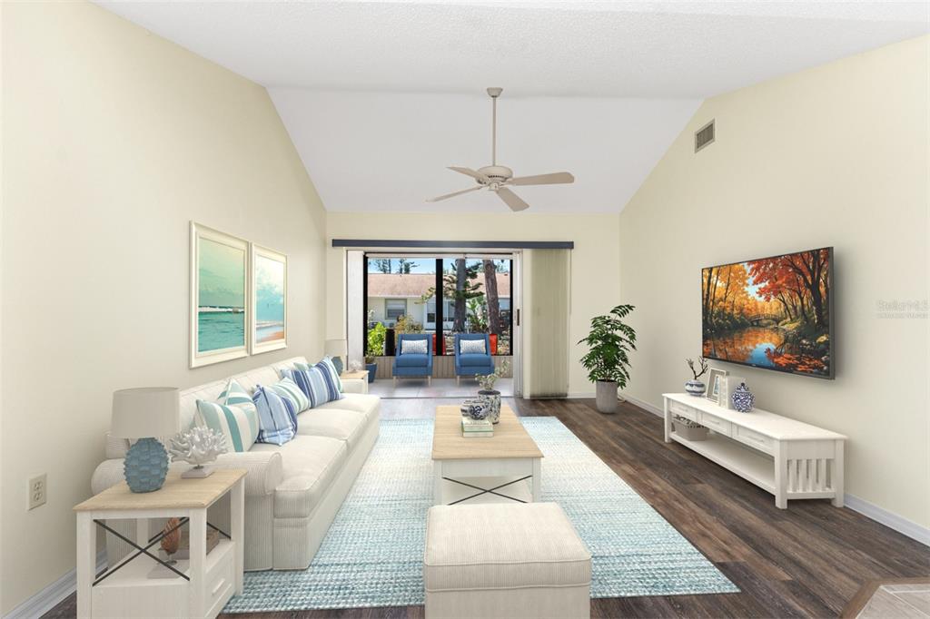 This is a virtual staging rendering of a living room with vaulted ceilings and wood floors — 6796 GASPARILLA PINES BOULEVARD UNIT 63, ENGLEWOOD, FL