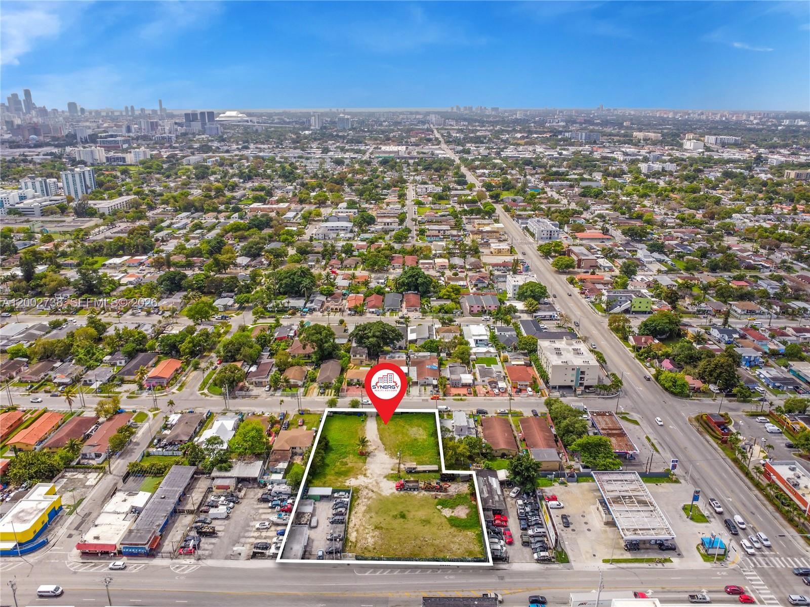 An aerial view shows a vacant, rectangular lot outlined in white within a suburban area — 2140 NW 36th St, Miami FL 33142, MIAMI, FL