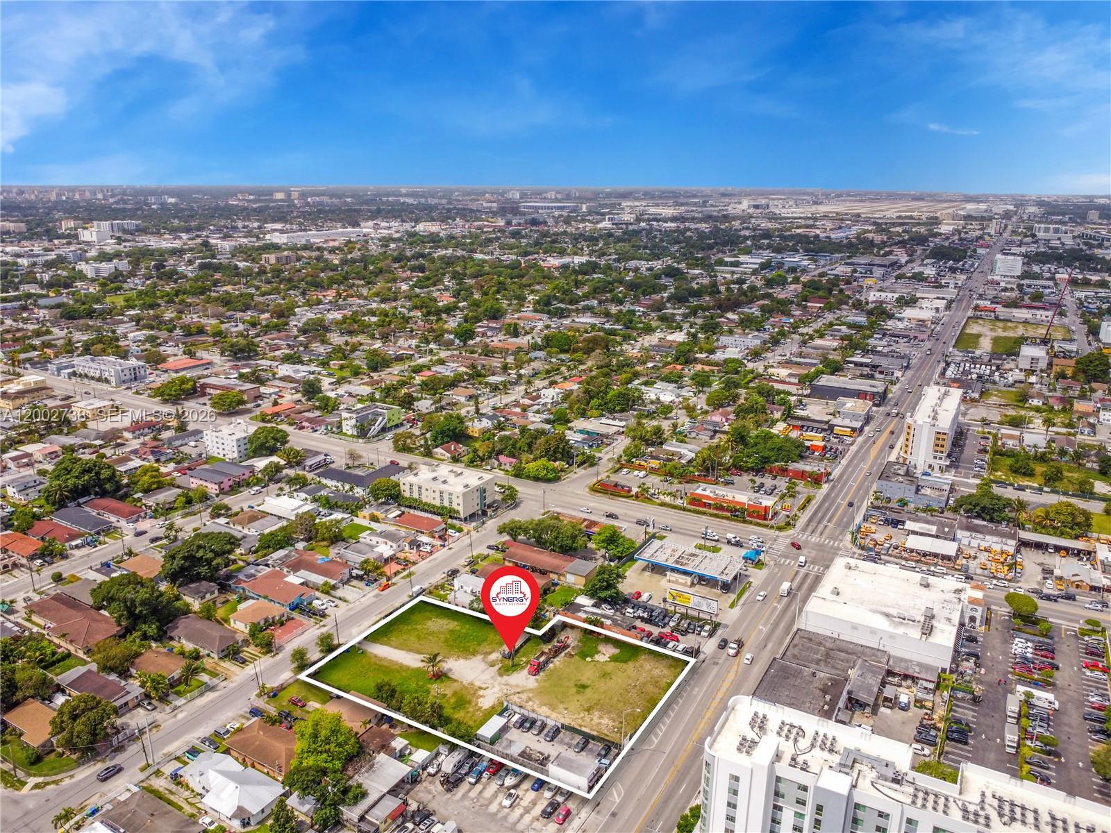 An aerial view shows a vacant rectangular lot outlined in white within a suburban neighborhood — 2140 NW 36th St, Miami FL 33142, MIAMI, FL