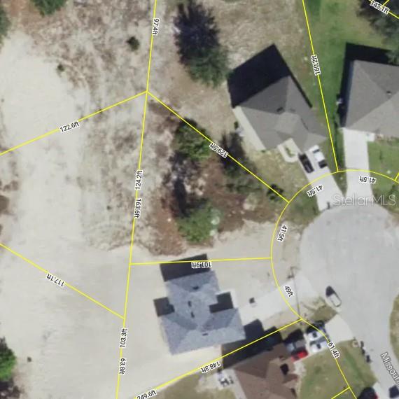 This is an aerial map showing property lines and dimensions for a residential lot — 1406 MISSOURI PLACE, POINCIANA, FL