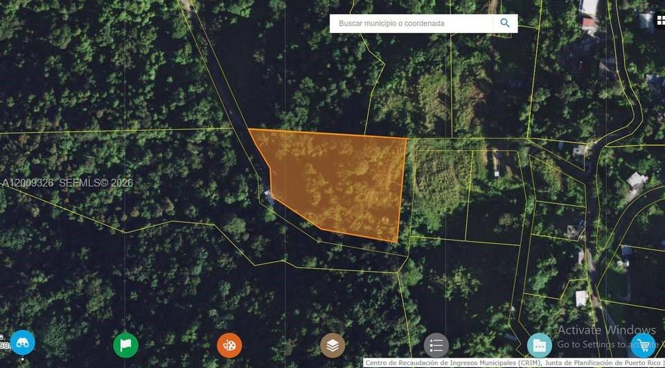 This is a satellite map view showing a highlighted land parcel in a wooded area — Bo. Campo Rico Carr 9957 Solar F KM3.2, PR 00729, PR