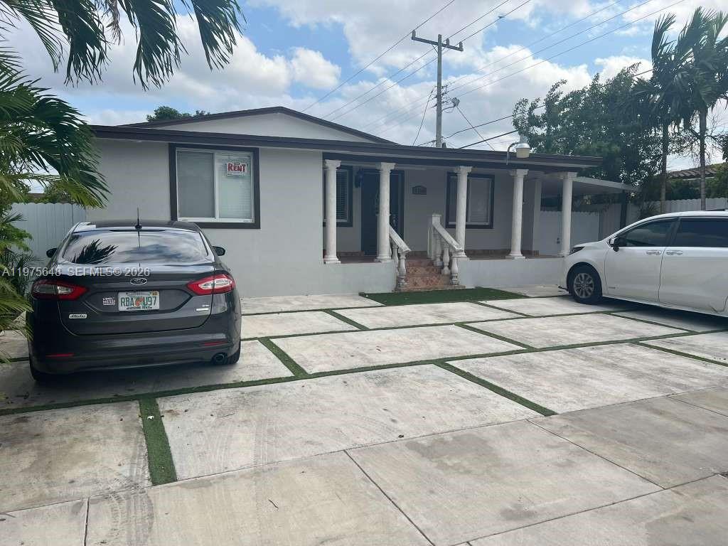 A single-story house with a concrete driveway and a covered front porch with columns — 4365 W 1st Ave, Hialeah FL 33012, HIALEAH, FL